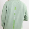 Crewneck-Regular-Line-Superheroines-Ride-Mujer-VerdeAqua-2 Crewneck Regular Line Superheroines Ride Mujer VerdeAqua 2 scaled